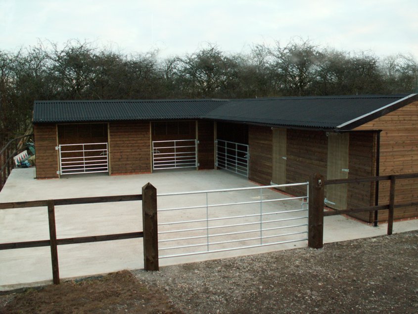 Fixed Corner Shelters with Gates and Tack room stable block